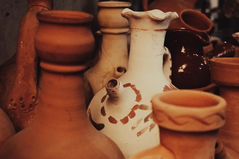 various vases are all different shapes and sizes