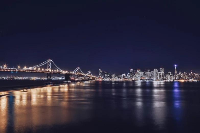 a view of a city at night from a distance