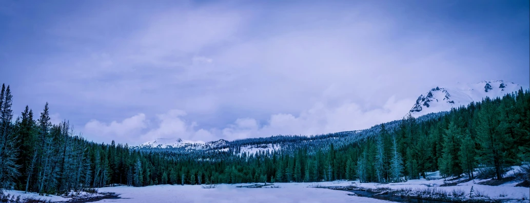 a mountain view of the river and mountains