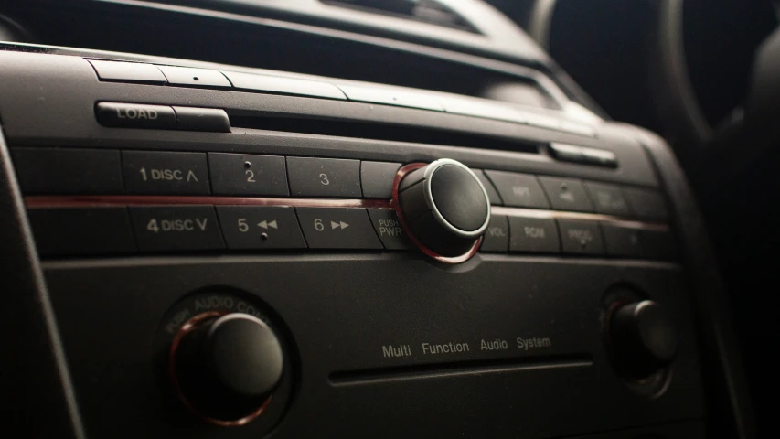 a radio in a car shows a on with a black background