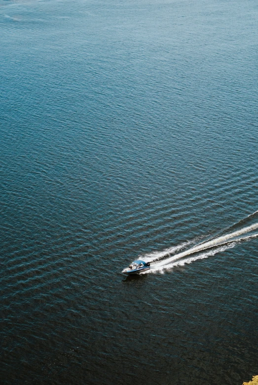 a motorboat is traveling down the water