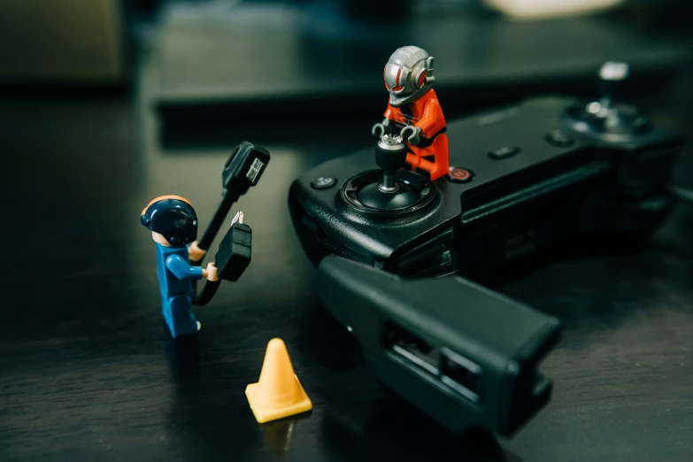 some toys and a toy car on top of a table