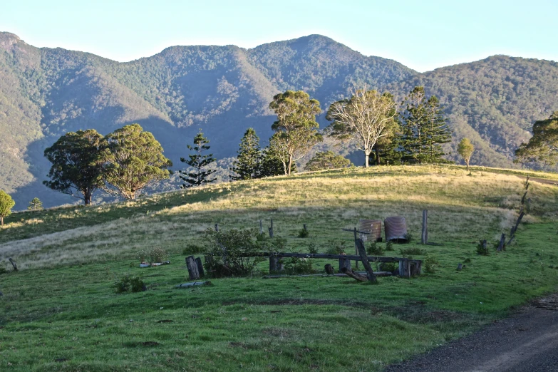 the mountains are visible as seen from a hill