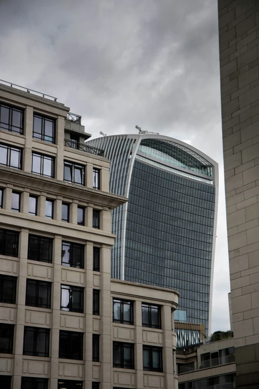 a group of buildings sit next to each other on the street