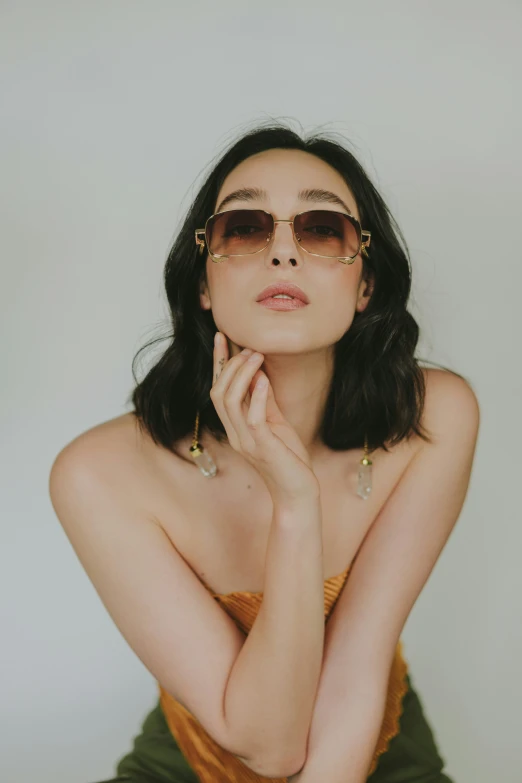 a woman with glasses, on a white background