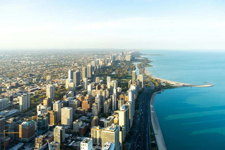 this is an aerial view of tall buildings and water