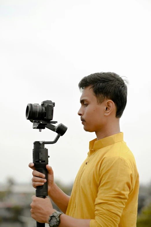 a man with a camera in his hand