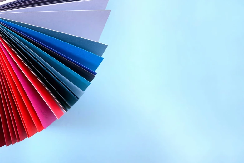 colorful folders on the table in different colors