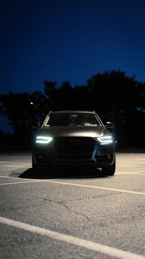 car at night with its headlights on