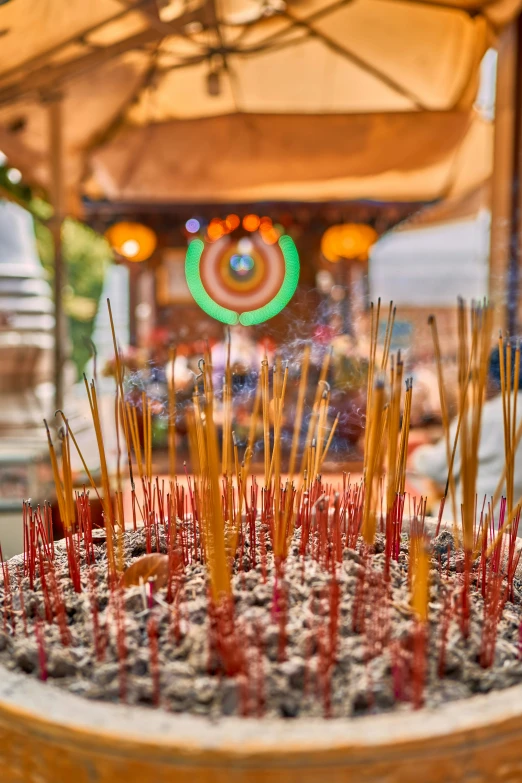 some little red sticks sitting on a table