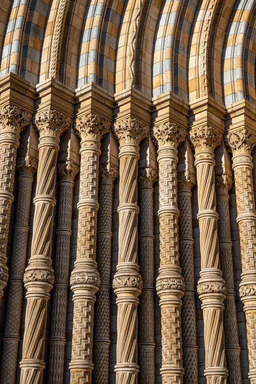 an image of ornate architectural columns lined up