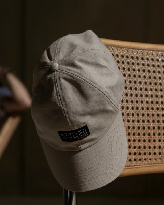 a close up of a hat on a chair