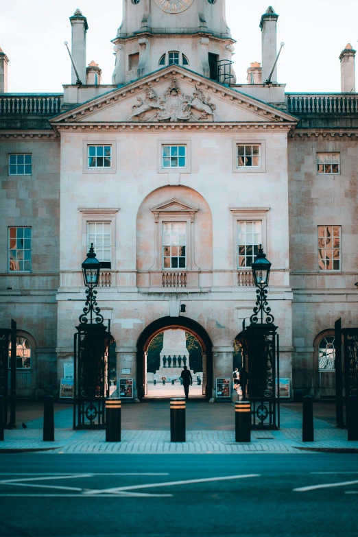 a large building with an entrance on a road