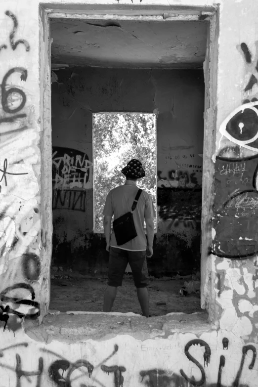 a person standing in an old abandoned building