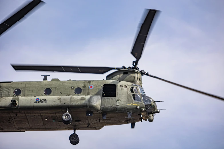 the front part of a helicopter with two large blades on it's head