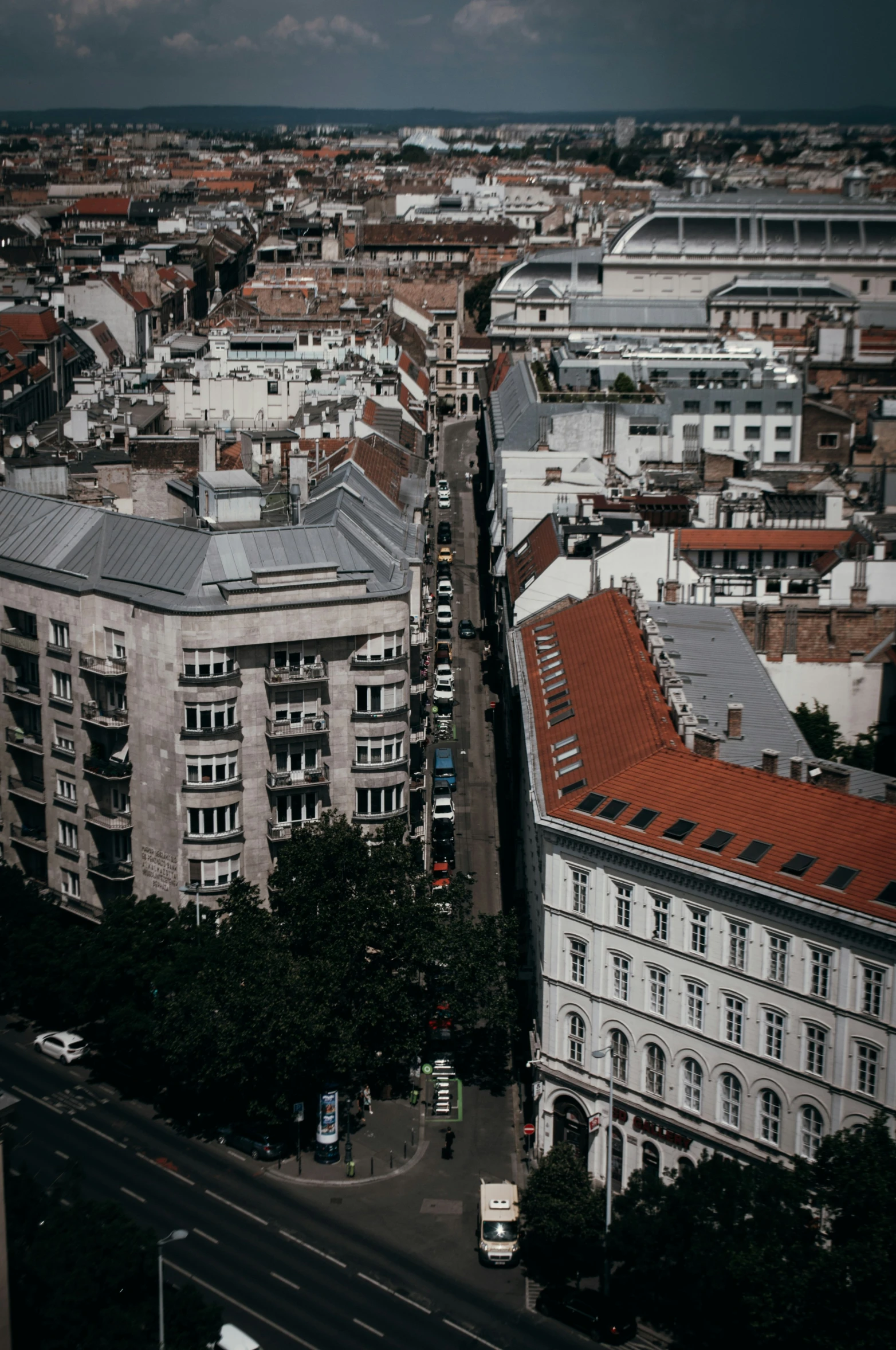 an aerial view shows the cityscape of a large area