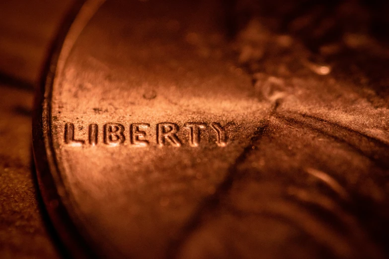 a blurry po with the word liberty etched on it