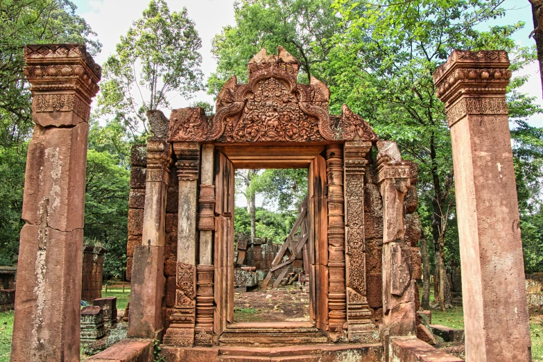 the small entrance to the temple is constructed with stone