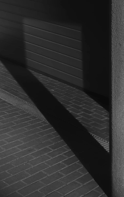 a street with some shadows on it