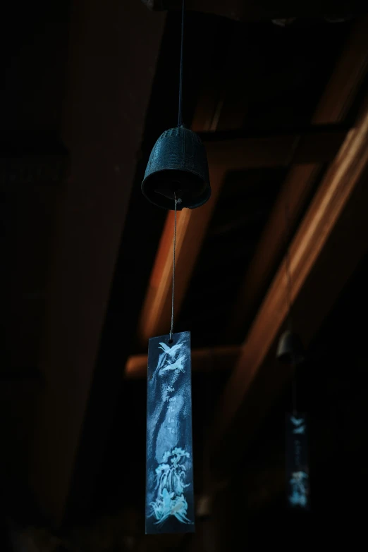 an image of hanging lantern with paper bag on it