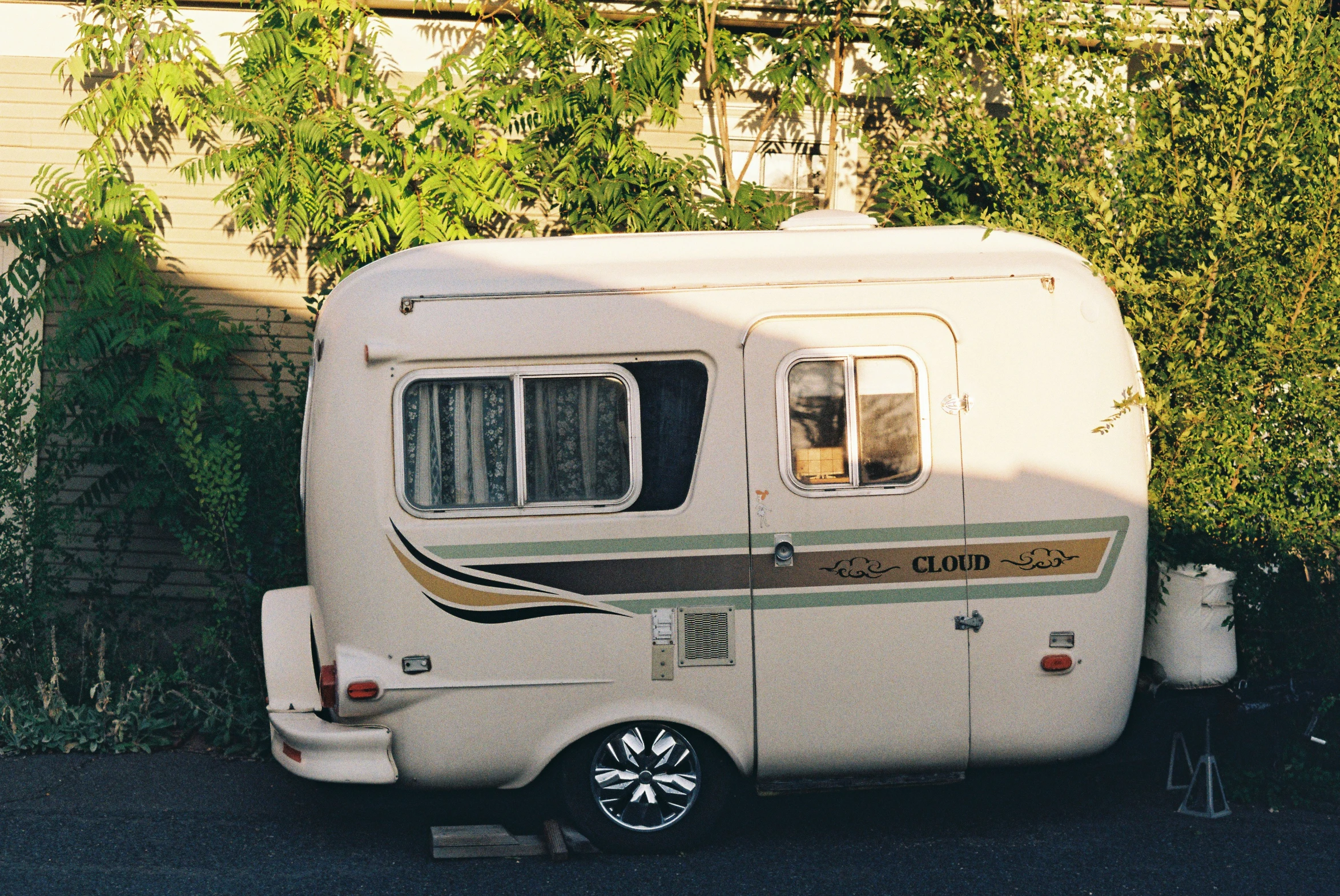 an old camper van with no windows parked