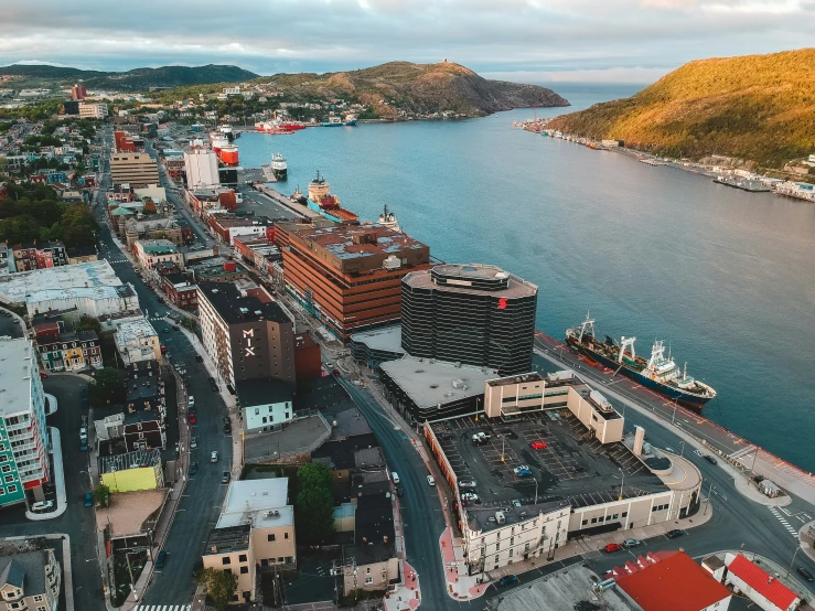 an overhead view of city and waterfront, including a body of water