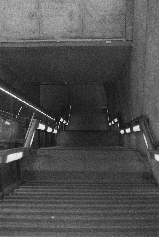 black and white po of some escalators