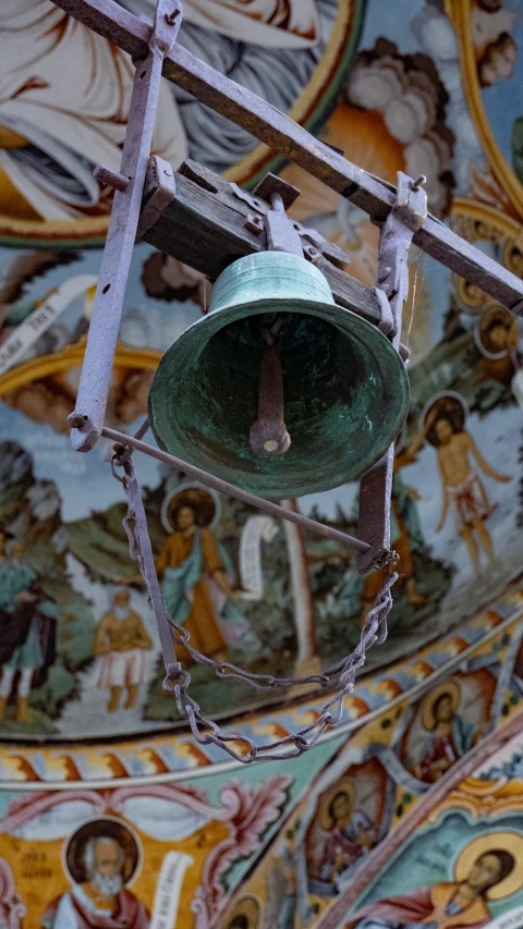 bells in an ornate decorated wall and ceiling