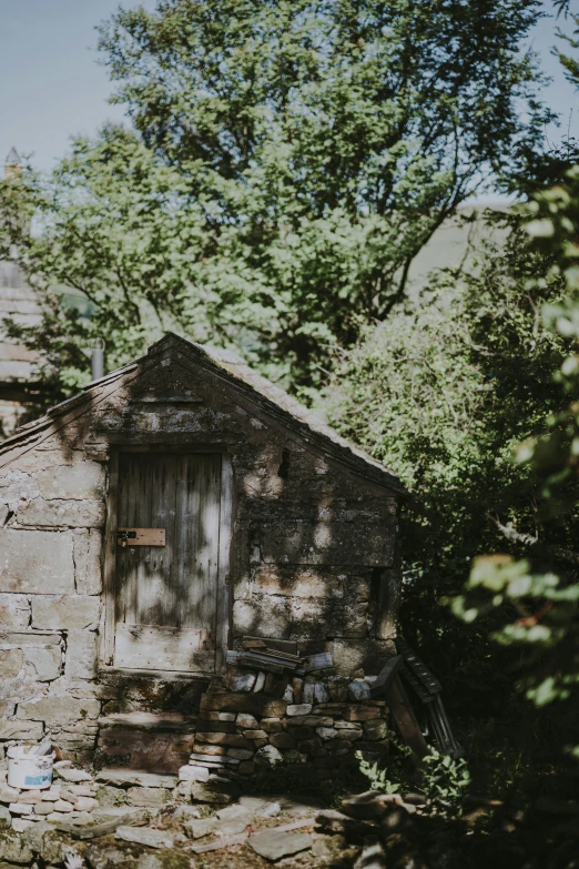 a brick building sitting near a stone path