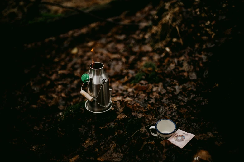 a jar that is sitting on some rocks