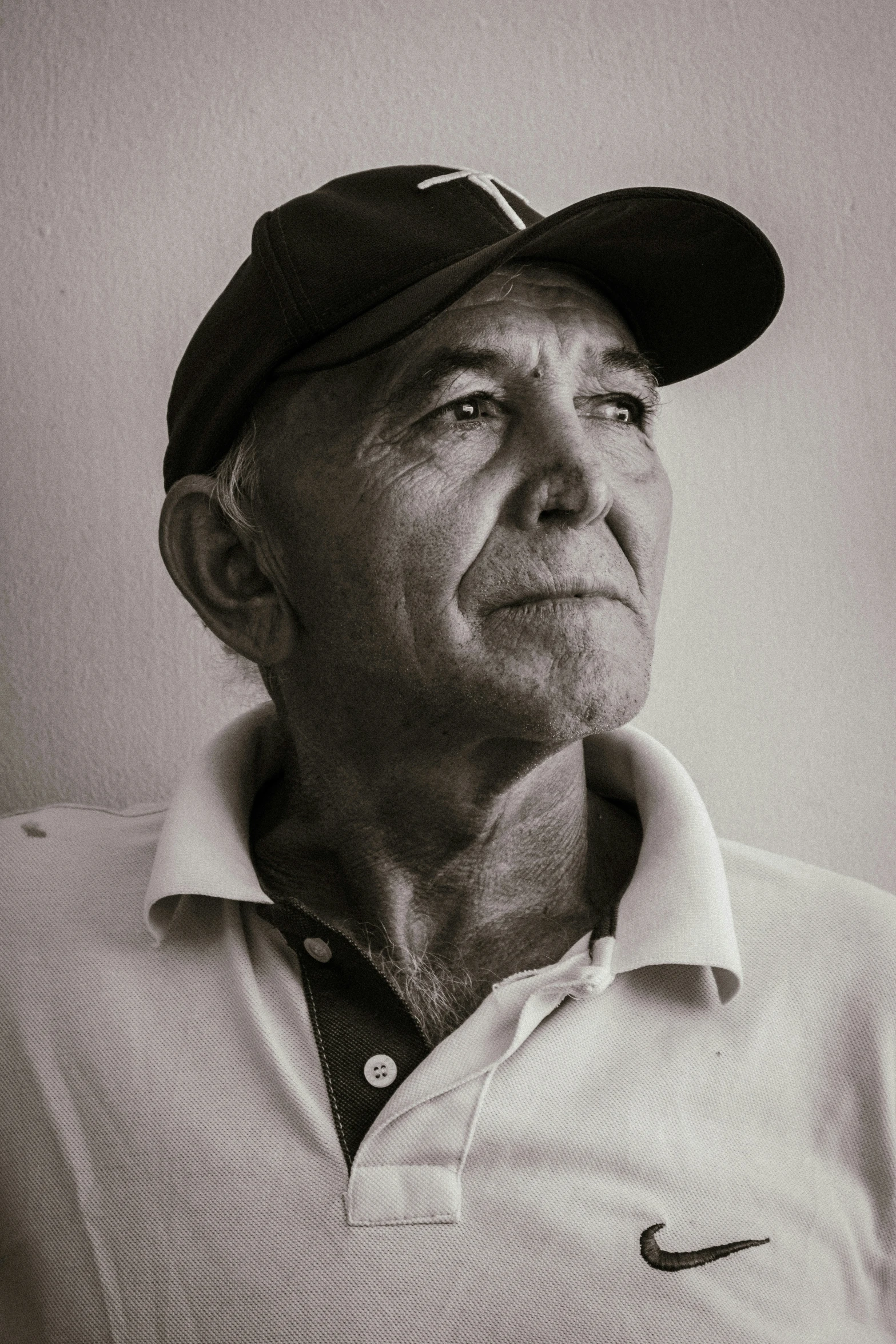 a close up of a person wearing a hat