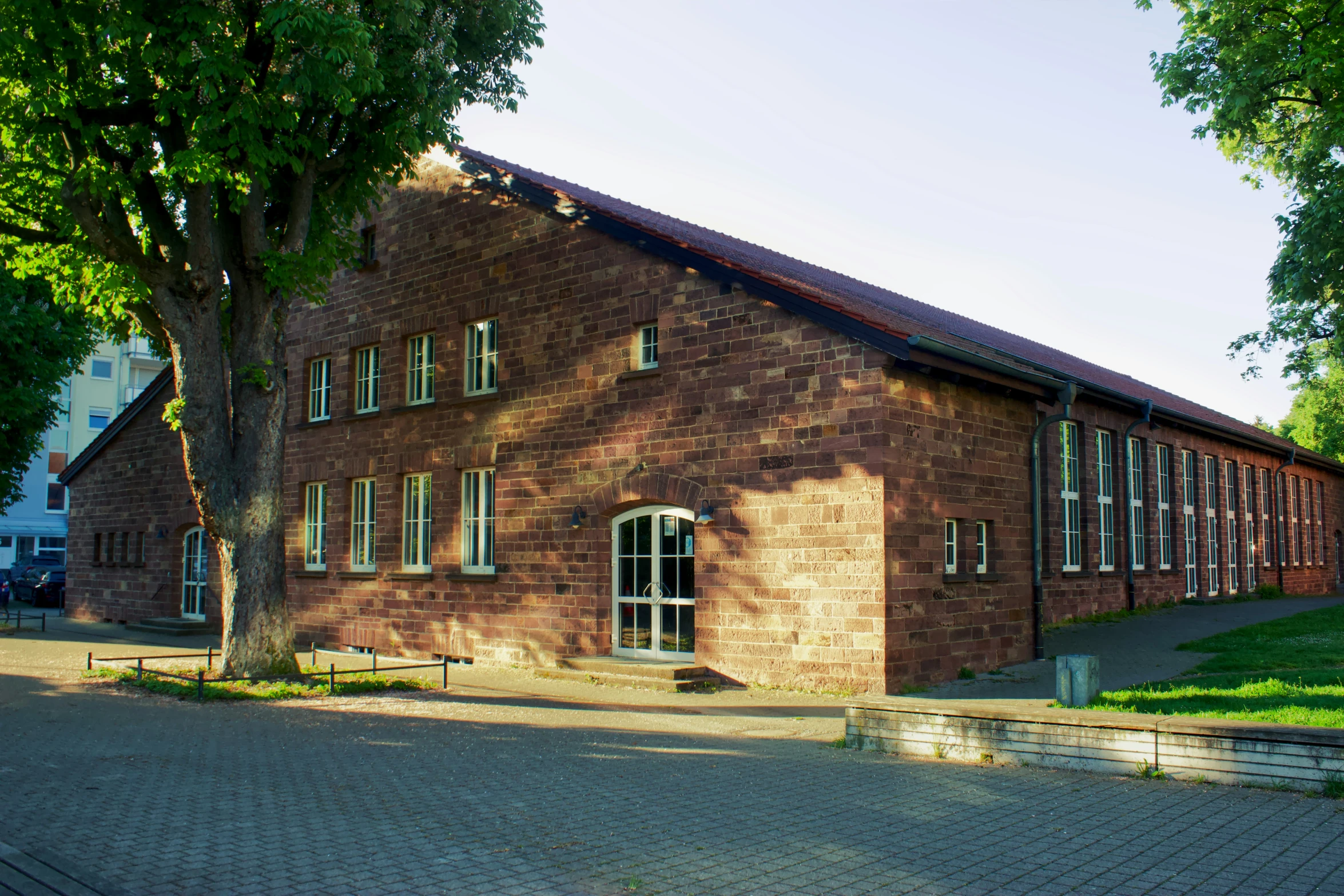 a brick building with some windows on the side