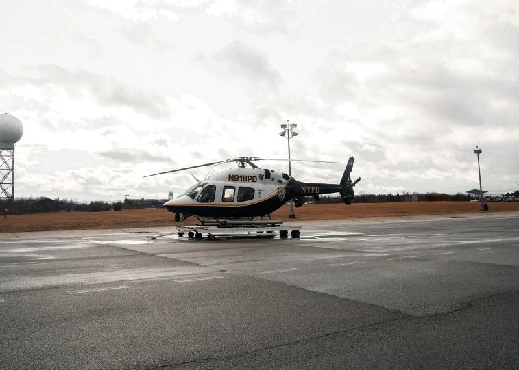 a helicopter is sitting in the air and ready to take off