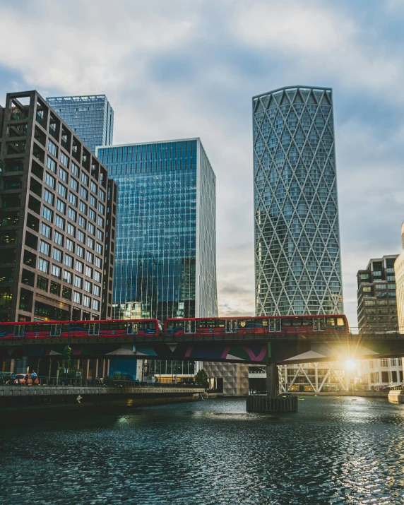 some tall buildings and a bridge in the city