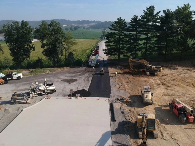 construction equipment is setting in a barren area