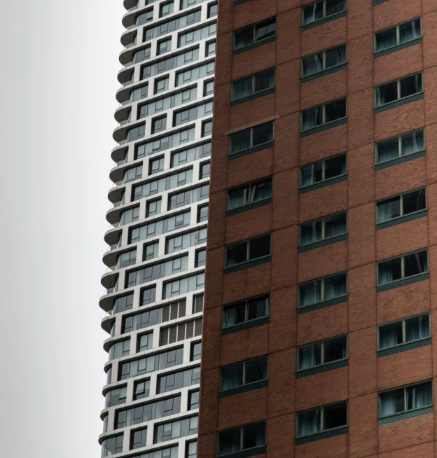 a tall building with a clock attached to it