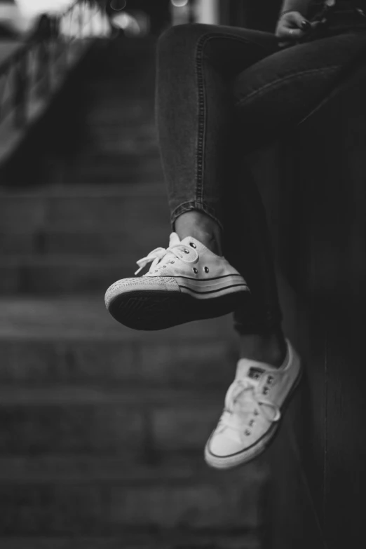 black and white image of a persons shoe