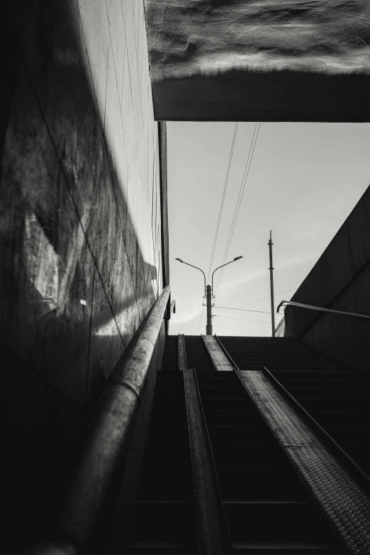 a staircase leading to some high voltage wires