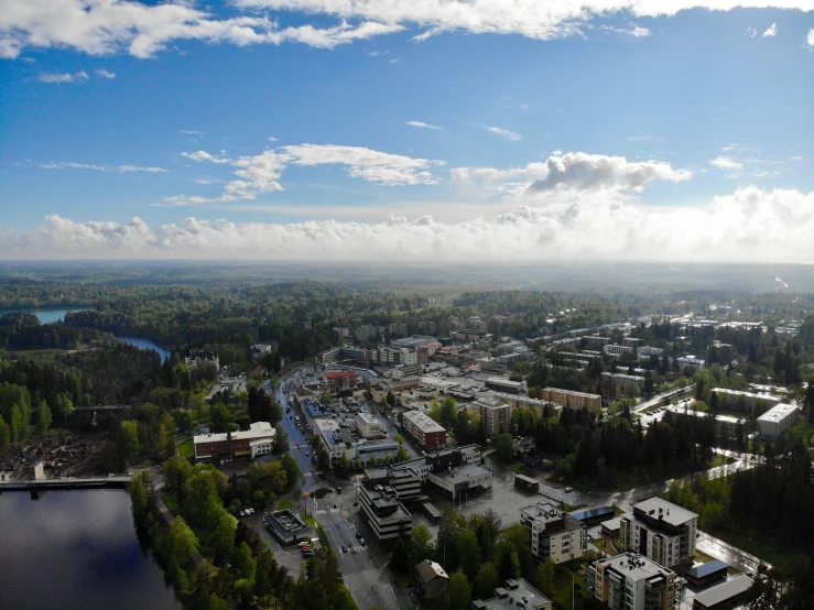 an aerial s of a town near a body of water