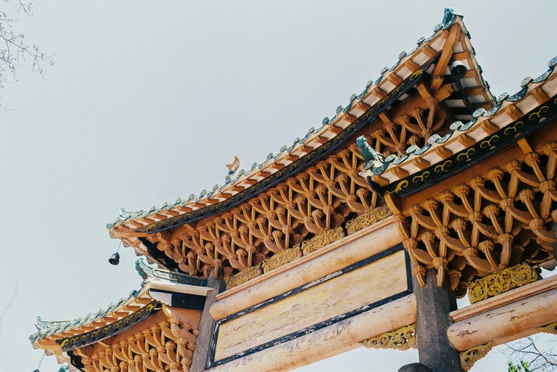 a structure with ornate architecture and hanging decorations