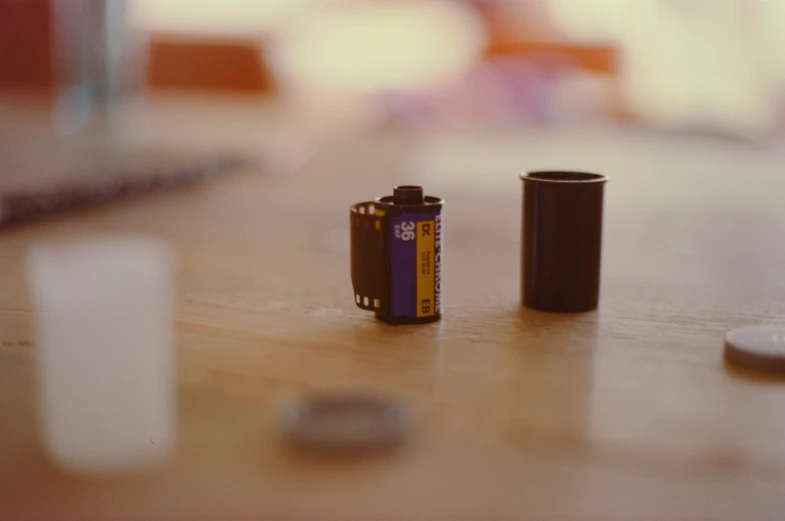 two batteries sit on a table top