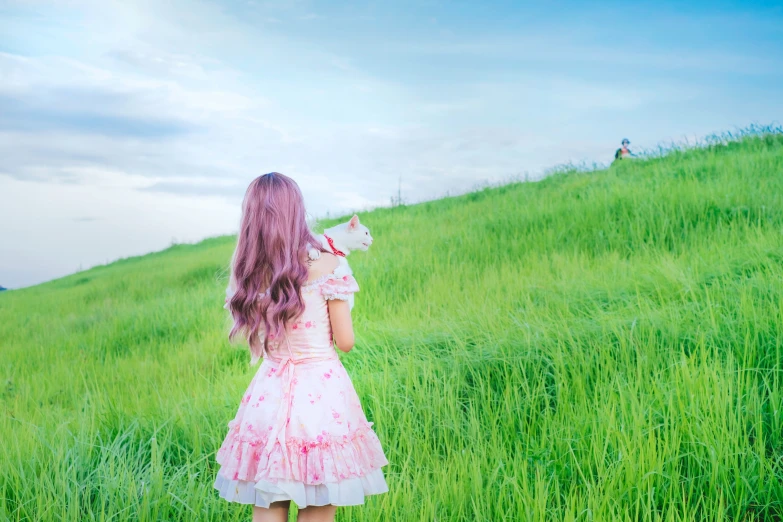 a girl looking down the hill at soing