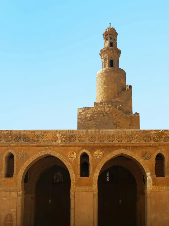 a large stone building with a clock tower