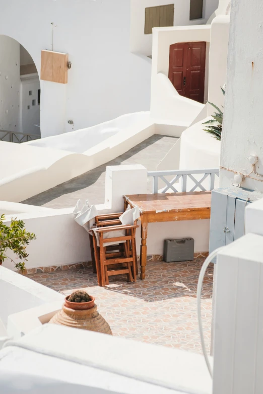 a table and chairs are on the patio outside