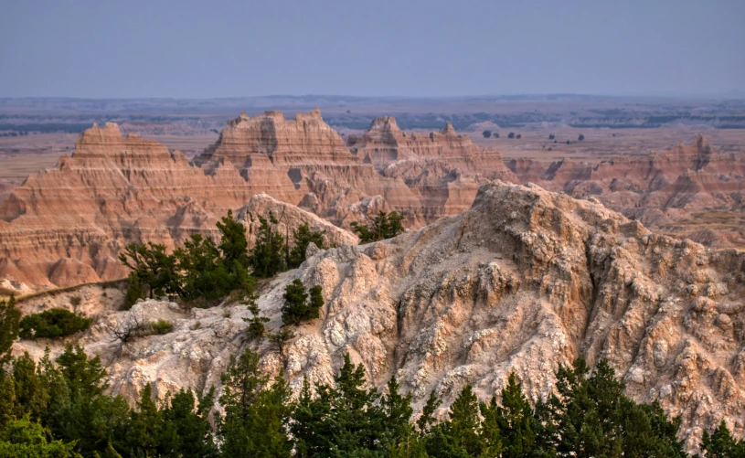 there is a rocky mountain top in the middle of this landscape