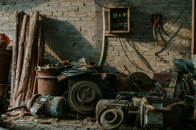 old rusty objects and tools on display outdoors