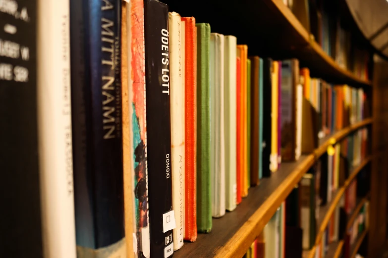 a row of books on a shelf at a liry