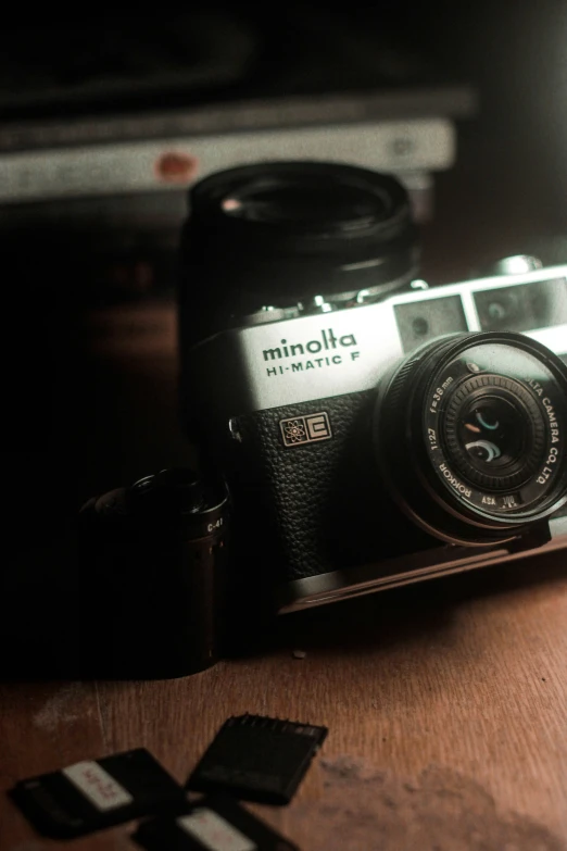 an old camera is sitting on a table