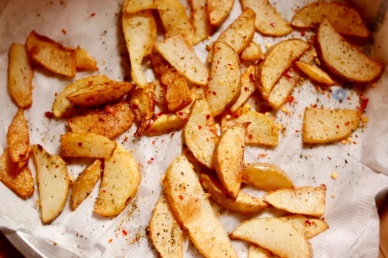 some fried apples sit on a tray and are ready to be eaten