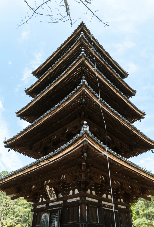 a large building with lots of wooden beams on top of it